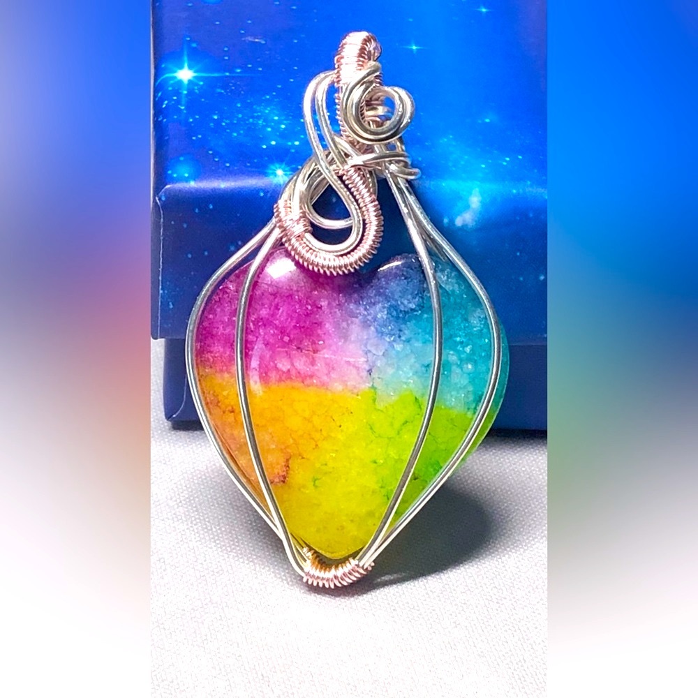 Colorful solar quartz heart in silver and pink